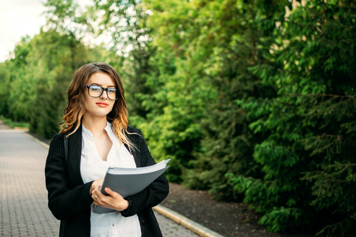 Young business professionals, gen z woman working, first job, interns, internship. Candid portrait Young business professionals, gen z woman working, first job, interns, internship. Candid portrait