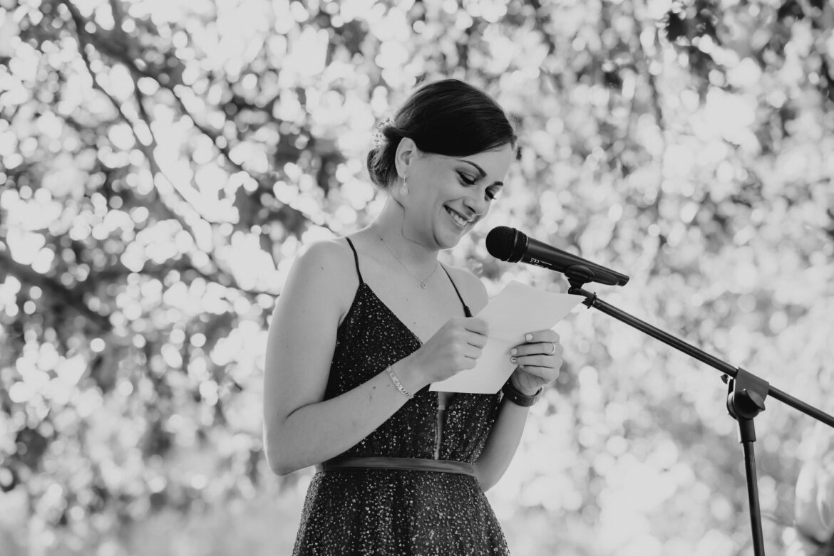 Young woman reading a speech Young woman reading a speech